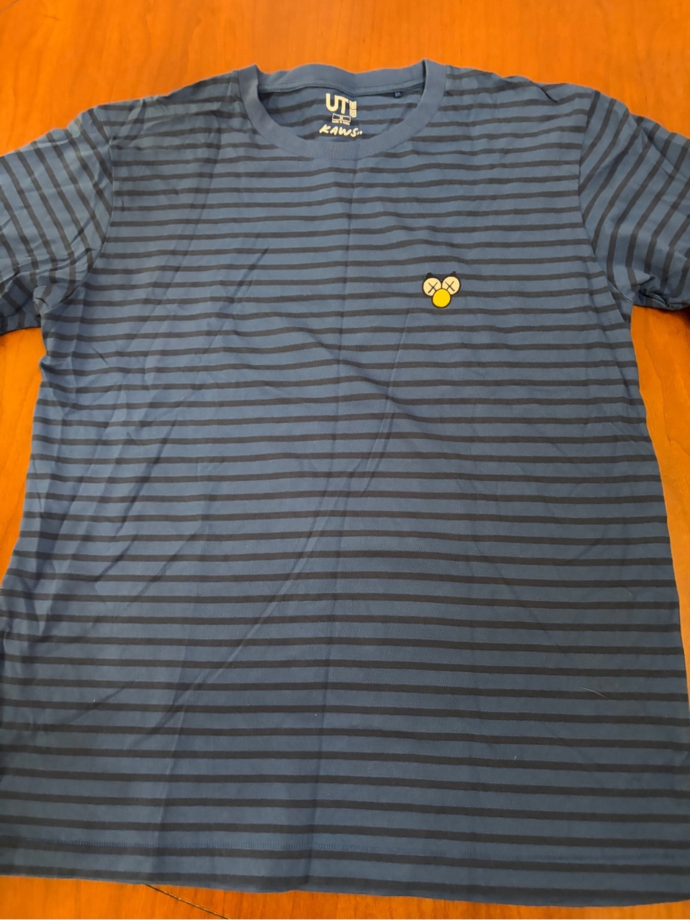 KAWS Navy and Blue Striped Crewneck Tee